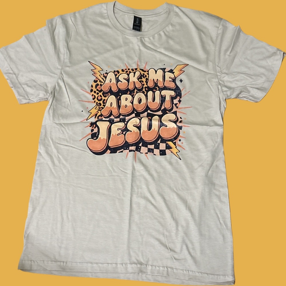‘Ask Me About Jesus’ Cream T-Shirt
